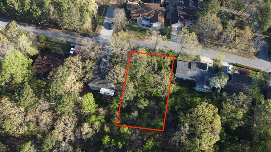 Tucked into the natural beauty of Bella Vista, this lot offers a rare chance to build right where adventure meets serenity. Just moments from the Back 40 Trail System, you’ll have world-class biking and outdoor exploration practically at your doorstep. Located less than 2 miles from the Missouri border, this property combines peaceful surroundings with easy access to nearby amenities. Whether you're envisioning a modern retreat or a cozy getaway, this homesite sets the stage for it all.