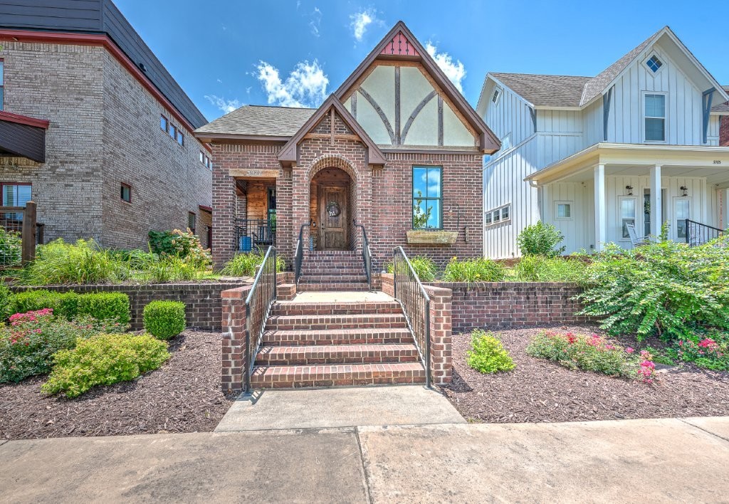 Charming brick home in sought-after Oakbrooke subdivision, admired for its unique craftsman-style homes with quality finishes! Lovely landscaping draws you to the covered front porch. Upon entering the home, a clever open-concept floorplan, beautiful wood floors, bountiful windows, and 10-foot ceilings await you. The ample living room opens to the eat-in kitchen, featuring stained wood cabinets with soft-close doors and drawers, granite countertops, gas range, and refrigerator that does convey. Between the kitchen and laundry room is an 8ā x 4ā office with built-ins and under-cabinet lighting, the perfect spot for your desk. The front two guest bedrooms and hall bathroom are separated from the primary bedroom suite in the back of the house, with its fully tiled walk-in shower w/bench, granite countertops, separate toilet room, and walk-in closet. Located steps away from the paved bike/walking trails and convenient to schools, shopping, dining, the U of A, the interstate, and all things NWA has to offer!