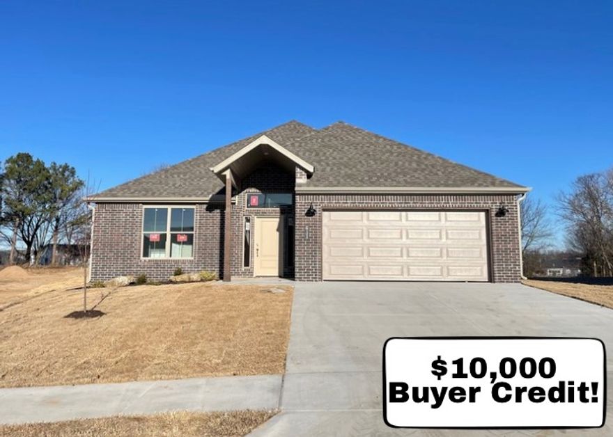 Beautiful one level new construction in Heritage Ranch Subdivision. Located on a large exterior corner lot, enjoy an amazing, upgraded yard space! This home boasts high end features throughout including Luxury Vinyl Plank flooring, Designer Finish Selections, and Quartz Counters to name a few. The bright entry welcomes you in with access to three large guest bedrooms and a guest bathroom. The living space is spacious and open, great for everyday and for entertaining guests. The large eat-in kitchen has plenty of natural light, counter bar seating, and a huge pantry space. The living room boasts large windows overlooking your private backyard, along with a gorgeous fireplace with built in shelving feature. Ample dining space offers more living layout options. The primary suite is a private retreat with luxurious attached bath including a soaking tub, double vanity, large shower, and WIC that connects to laundry. Located close to Schools and Parks with easy access to Downtown Siloam.