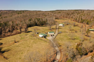 Come check this one out. Just a minute off of highway 65 in Bee Branch Arkansas sits this amazing property that features 121+/- acres, beautiful cabin, 3 beautiful ponds, horse barn, shop and paved access all the way to the property. The cabin is a 1 bed, 1 bath, nicely done rustic interior, central heat and air, rural water, and a separate attached laundry with an additional 1/2 bath. Beside the cabin there is a detached 3 bay garage/shop for a perfect place to store all your toys. The pasture area is fenced, cross fenced and all set up for horses with a nice horse barn, (4) 12x12 stalls, enclosed tack room, feed room and overhead doors on each end for convenience. No need to make a long drive to your hunting land, Just wake up,