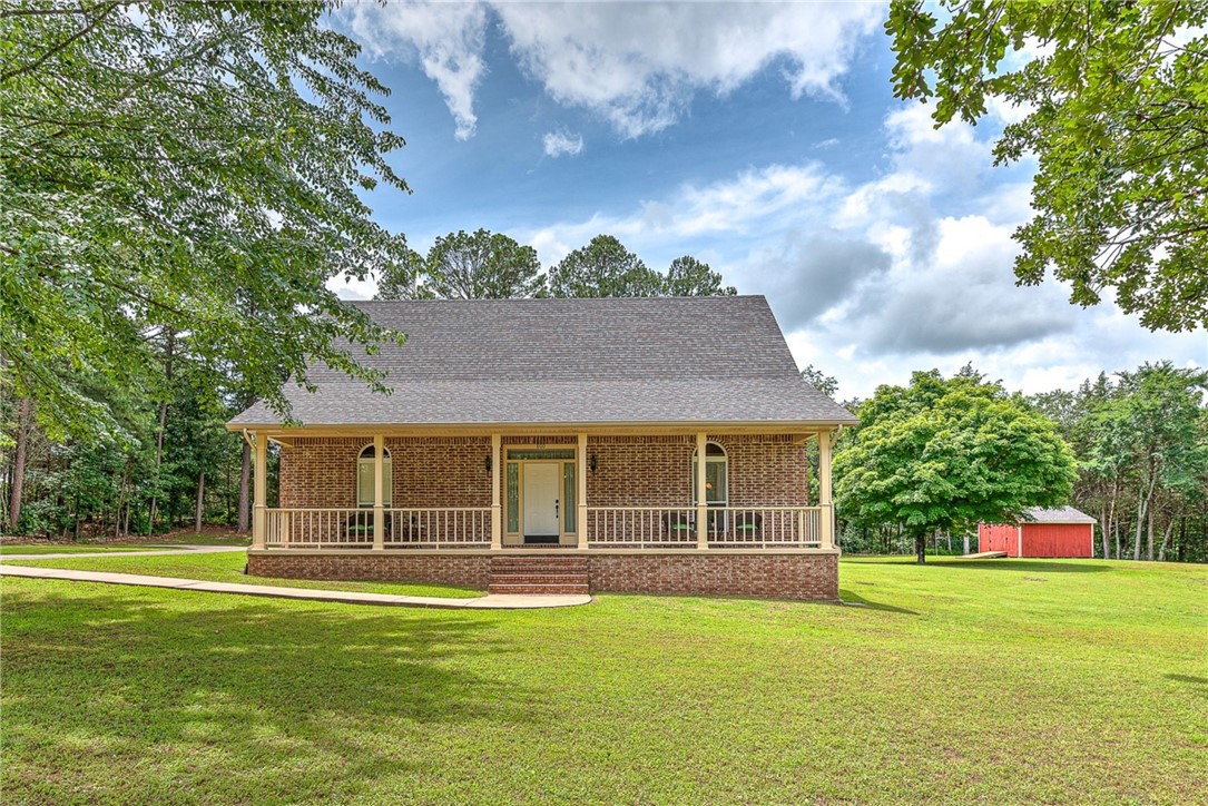 Tucked into the trees on a private 1.02 acre lot, this charming, well maintained home offers a rare blend of space, privacy, and timeless curb appeal. A full-length front porch welcomes you into a well-designed main level featuring a sunny breakfast nook, formal dining room, a kitchen with center island, convenient laundry room, and a spacious primary suite with a walk-in closet and private bath.
Upstairs, youāll find a bonus room, two additional bedrooms, and full bath. Step outside to a peaceful backyard surrounded by mature treesāideal for relaxing, gardening, or entertaining.
PLUS, assume a 2.25% VA loan (subject to lender approval)! Roof and HVAC system installed in 2019, ensuring peace of mind for years to come. Located just a short walk to the Huntsville Rodeo and Fairgrounds, and 3 minutes to shopping, dining, and all the amenities of downtown Huntsville, this is a rare opportunity to enjoy both space and convenience in one beautiful setting. Don't miss your chance to make this home your own!