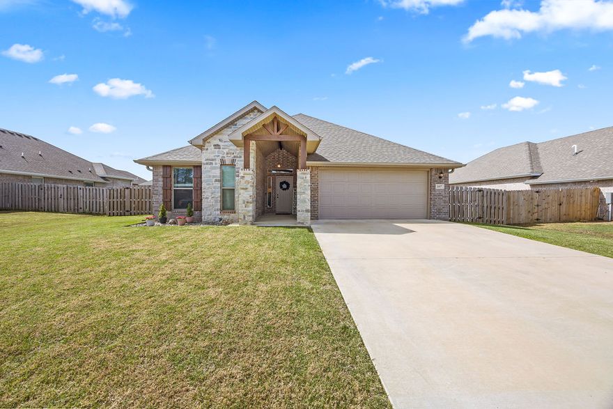 Qualifies for $0 down + $3,000 in seller concessions + preferred lender credits! This one has it all! Located in a quiet neighborhood just minutes from schools, shopping & more. This all brick, 4 bedroom home is priced as the lowest home per square foot in the entire neighborhood-- and yet has so many great amenities! Quartz counters, fresh paint, vaulted ceilings, fully fenced backyard, & updated lighting. This move-in ready home offers the best in open- concept living with a spacious kitchen with large island overlooks the open living room & dining area. Kitchen is equipped with modern, slate appliances, spacious pantry, & tons of counter space! The spacious primary suite offers a peaceful retreat with a walk-in closet, soaking tub, & walk-in shower. Savor the long summer-nights on your covered back patio-- just bring the grill! Washer, dryer, & refrigerator all convey to the buyer. Conveniently located just 8 miles from the Bentonville Square and less than 5 mins to I49.