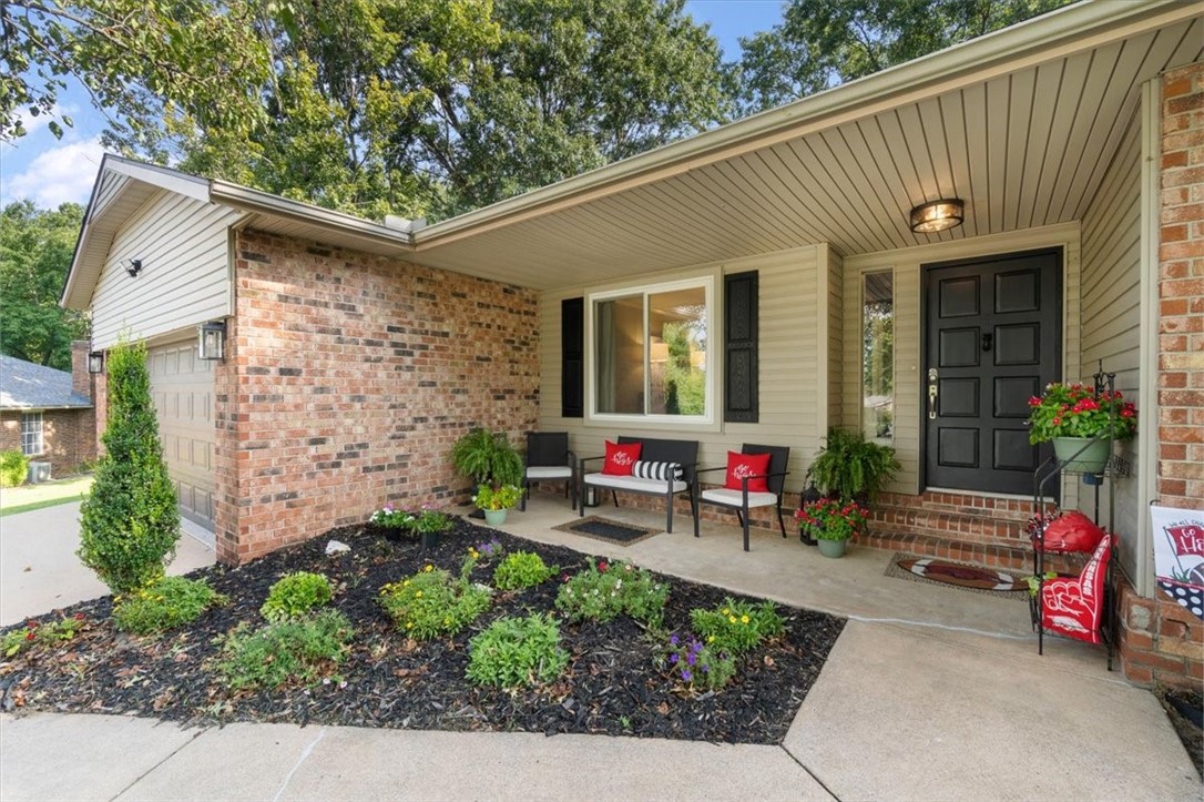 Location-Location.Fayetteville Country Club Hill This is a rare, simply adorable , 1 story home & move-in ready. It is Nestled in the end of a quiet Cul-De-Sas w/ Large Mature Trees & Private back yard. Great family room w slate surround Wood Burning fireplace,Huge Panty/storage off kitchen & utility. New Luxury Vinyl Flooring:2022, New Glass Cooktop 2023 w/ a gas line right there should new owners prefer a Gas Cook Top. Oven 2023, Wood Blinds 2022-2024, Roof 2020, Kitchen granite & tile Back splash, Sink and faucet 2019-2020, AirConditioner 2023, Dishwasher 2024, Hall Bath quartz countertop, sink, faucet, floors, Lights, & Exhaust Vent:2024. Easy access to I-49 approx 3-4 minutes max (Not even a traffic light between leaving the house and entering onto I-49... and only One traffic light when exiting I-49 and returning home to "The Hill". 5 minutes to the famous Fayetteville Square, Dickson Street, & Baum Walker Stadium. 7-8 minutes to Bud Walton & Razorback Stadium. This is a hidden Gem and so easy to maintain.