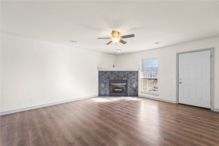 Newly renovated home in the highly desirable Champions Estates Subdivision, located in the Bentonville School District! This beautiful property features fresh paint, newer laminate flooring, & modern updates throughout. The open layout offers a functional floor plan & the living room showcases a corner gas-log fireplace with custom honeycomb tile, while the eat-in kitchen impresses with contemporary open shelving. A dedicated laundry space helps keep everything tidy & organized. Spacious bedrooms provide comfort for the whole family, with the primary suite conveniently located on the main level. Enjoy outdoor living in the fully fenced backyard with an open patio. Prime location just minutes from Pinnacle Hills Promenade Mall, Walmart AMP, Topgolf, & nearby trails, with less than a 15-minute drive to XNA. Don’t miss the opportunity to make this exceptional home yours!