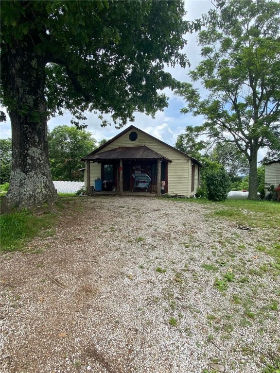 Bordering the National Forest, this cute little cabin sits on four acres and has perfect access off HWY 16. There is a 30 X 30 shop and a house pad has been prepared on the western corner of the property if a new home is in your future. Located approximately eight miles from Deer, this property is in the prime location for hunting, hiking, ATV riding or enjoying the Buffalo River a short distance away. This property will make a great starter home, weekend getaway, or an investment as an Airbnb. Call today for your private showing.