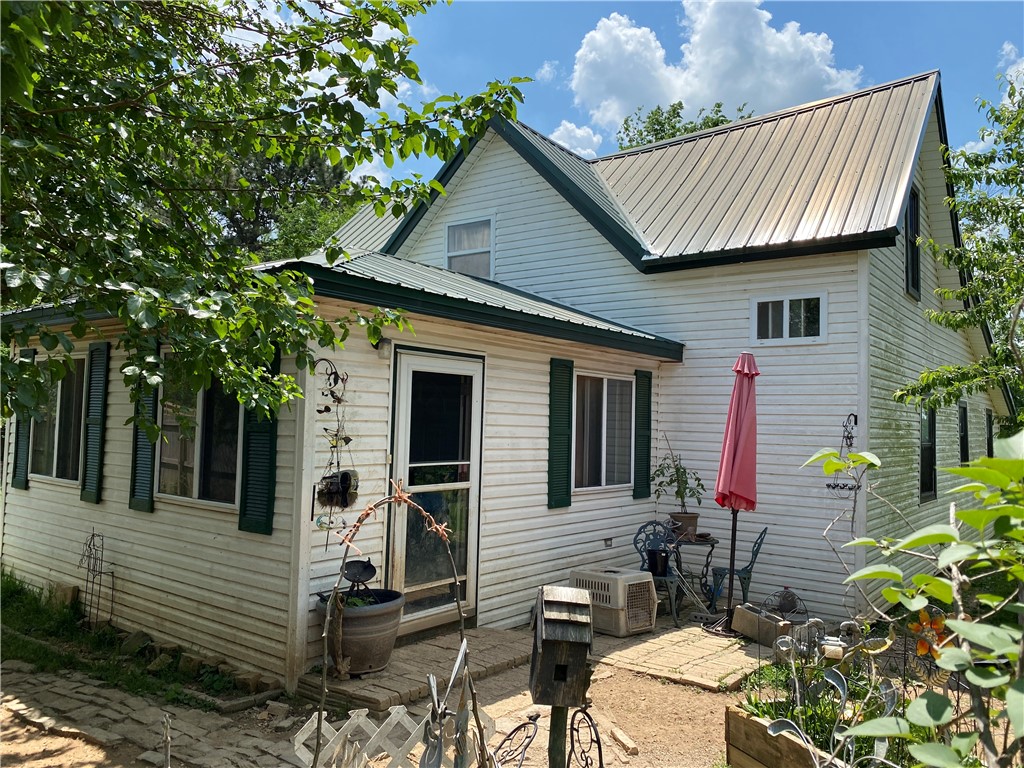 This fixer upper home will only go cash. Privacy wood fence goes around the entire yard. Yard has several mature fruit trees, cherry, plum, pecan, mulberry trees, apple, also, grapes, raspberries and blackberry. Home needs work. Bring your investors. Washer/Dryer stove stay, cannot guarantee these are working appliances. Home has 3 bedrooms, 2 bedrooms have attached rooms. You must call for appt due to large dogs on property that will not let you in. Owners will put away and wait while showing. Foundation and floors need repairs.