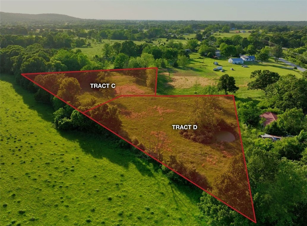 Endless possibilities! Check out this 2.57-acre ± lot in a fantastic location, just 10 minutes away from Springdale, 15 minutes from I-49, 9 minutes from a public ramp into Beaver Lake, and just 15 minutes from War Eagle Park & Marina. No deed restrictions, out of city limits! Electric and public water are available at the street.
