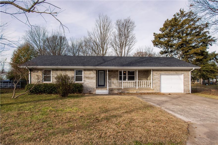 Brand new roof and siding in 2025! All new paint throughout! This well-maintained, spacious, four bedroom home offers ample space and functionality, featuring two distinct living areas and a well appointed eat-in kitchen—perfect for large gatherings. The primary suite includes a private en-suite half bath for added convenience. Two additional bathrooms provide versatility, with one featuring a shower/tub combination and the other a walk-in shower. Designed for easy maintenance, this home has durable laminate and ceramic tile flooring throughout. Step outside to a large, private backyard with mature landscaping, deck and a privacy fence. A storage shed offers plenty of room for tools, equipment, and recreational gear. Ideally located close to shopping, dining, schools, and major conveniences in Siloam, this home is a fantastic opportunity for comfortable living with ample square footage. Refrigerator, washer and dryer can convey with acceptable offer.