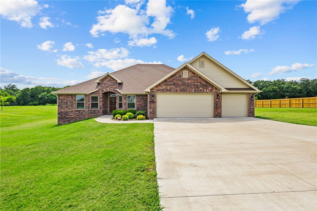 Check out this stunning all-brick home that is practically brand new with 5 spacious bedrooms, 3 full bathrooms and open concept split floor plan on large 1.5-acre lot. The kitchen is a dream with custom maple cabinets, granite countertops and top of the line stainless steel appliances, perfect for entertaining or preparing dinner for your family. Safety is top priority with a walk-in storm shelter in the garage, clean air filtration system, outside flood light and whole house surge protection system. If this isn't enough this home also features Cat 5 wiring, 2-inch faux wood blinds, extended covered patio with gas stub out and wired for outdoor entertainment. This house is a must see!