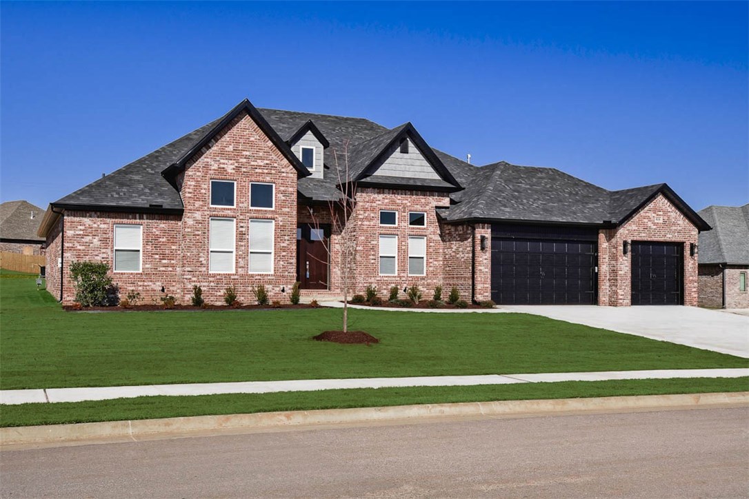 4 bed, 3 bath new construction on half acre lot. Picture is not of actual home, but similar plan and finish.