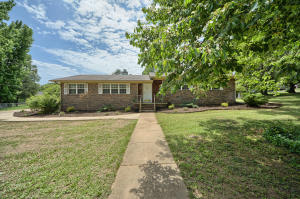 Totally updated Colonial Heights home with 3 bedrooms and 2 full baths as well as a 400 Sq foot bonus room that could act as a 4th bedroom, play room, gym, etc. Enjoy 2 large living areas, separate dining, lovely kitchen & a cozy fireplace. The highlight of this home is truly the HUGE LOT! Enjoy a fully fenced back yard complete with a firepit for those cool nights & patio for entertaining friends