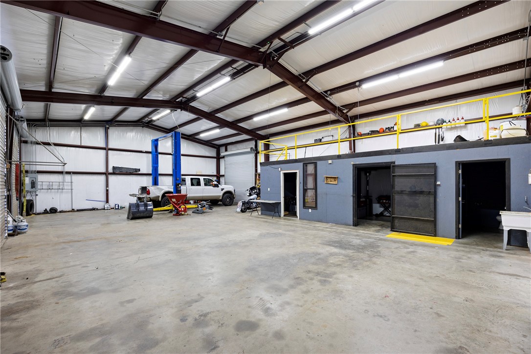 Currently leased with 1 tenant. One building is currently rented for $2300 a month, the second 2400 square foot shop is currently vacant and ready for the next business opportunity. This property includes 4.61 Acres and the sewer is running along the entire inside of this property for future expansions. The first building to the right as you enter is a Metal Shop 40 X 72 With roughly 800 Sqft that is office space. This building includes 4 Offices and 2 baths all heated and cooled by one Central Heat and Air unit. The second building to the left is a Metal Shop Newly built 60 X 40 with an Office, storage room and bathroom. This building includes 4 Roll up doors and a 12 Ton Car lift. Both buildings are setup with video cameras and full security around the property. This property is currently on one water meter and the water bill for both is paid by the seller. City sewer running on the exterior property line for possible future expansion.