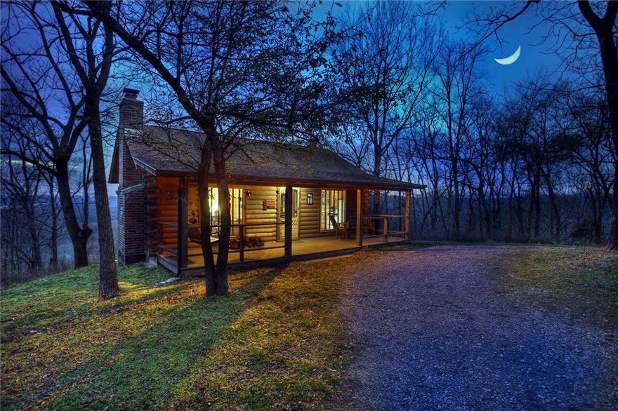 Very popular Ozark Cabin Resort & Event Center turnkey & ready for new owners. This gorgeous resort is situated on 125+/- acres with amazing views of the Ozark Mountains and Beaver Lake. Only 30 min. from Rogers/Bentonville & a few min. from Eureka Springs, this resort is a premier location for weddings and events. Only 1 mile drive to the White River for fishing & canoeing. 8 cabins, event center, living quarters, & office, 2 fully stocked ponds, wedding gazebo & all FF&E convey.