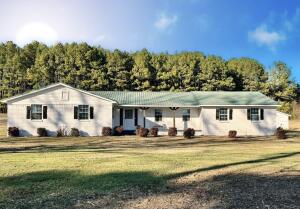 Beautiful home only minutes from Dover and just miles from the gorgeous Ozarks and Big Piney Creek. This home has fantastic curb appeal and features four bedrooms, two and a half bath, a fantastic laundry room, and a large living area. With a great front porch, you will love the peaceful privacy you get with this unique property!