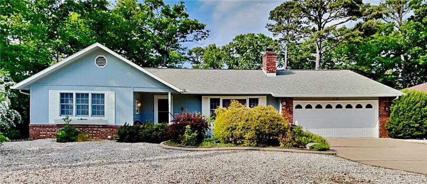 Nestled in a beautiful wooded area, this charming house is located a half-mile walk from the Back 40 Trailhead, making it the perfect home for outdoor enthusiasts. It is also conveniently less than one mile away from the 71, providing easy access to the surrounding area. Upon entering the home, you are greeted by a spacious living room with a cozy fireplace, making it the perfect spot for relaxation and entertaining guests. The house features two comfortable bedrooms and two full bathrooms. Additionally, there is a heated/cooled sunroom, as well as a deck overlooking the park-like backyard and gorgeous landscaping. The garage has a workshop area or extra storage space. A separate storage shed with power provides additional space for all your storage needs. This house offers the perfect balance of indoor/outdoor living, providing a comfortable and convenient home base for those who love to explore and appreciate the natural beauty of the area. Check the virtual tour today and then see it in person!