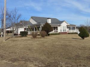 METICULOUSLY MAINTAINED! Story book setting! FIRST TIME ON THE MARKET. One owner estate has a winning floor plan. Spacious family room, formal dining room, large kitchen with a breakfast area. You will not believe the wrap around porch! Lawn is absolutely gorgeous and is a corner lot. Separate shop with work bench. (Outside bell does NOT convey)