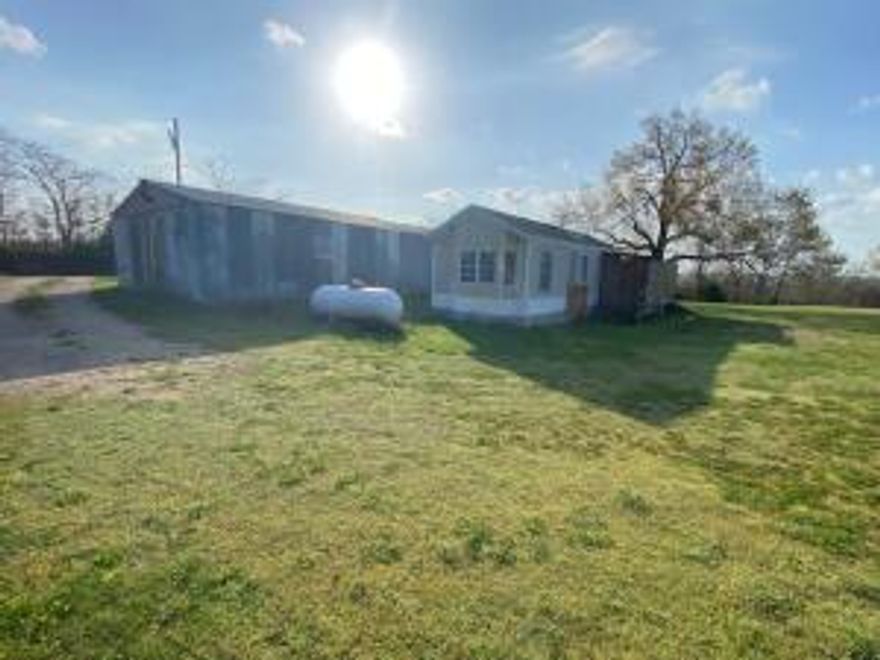 Lots going for this 1 bedroom mobile with a 24x97 shop bldg with concrete floor. Only 4 miles to Harrison and 30 minutes to Branson. All this on just under one level acre for future build.