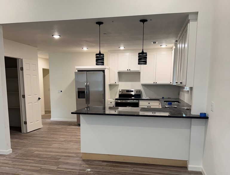 This home combines space, style, and location, ideal for families or professionals seeking comfort and accessibility. Welcome to a beautifully renovated 4-bedroom, 2.5 bathroom home with ample parking, located in the desirable Rogers area close to downtown. 2 of the bedrooms share a large, jack and jill bathroom. Just minutes from I-49, this property offers both convenience and comfort in a prime location close to shopping, dining, hospitals, and more. The home offers split bedroom layout, ideal for guests or home office. Eat-in kitchen with large walk in pantry, and stainless appliances. Brand new countertops and backsplash throughout the kitchen and baths. Newly installed flooring, light fixtures, fans, washer and dryer, fridge, paint.. Every single thing about this home has been redone, including new windows and blinds! Donāt miss out on this newly redone home close to everything Rogers!