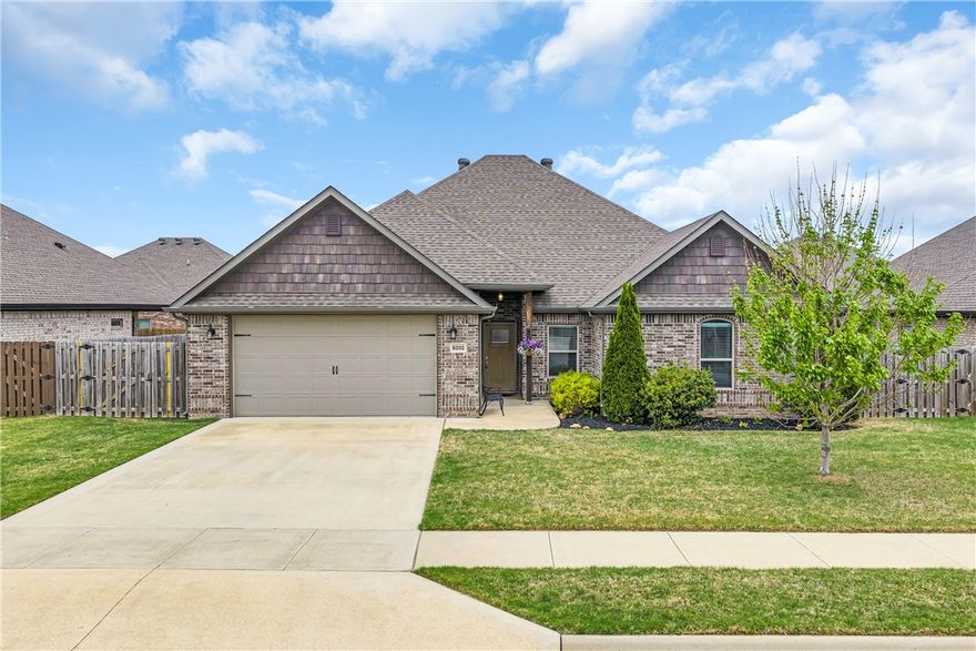 Step into your dream home in The Iveys Subdivision, Rogers! This immaculate meticulously-maintained 2,085 sq ft gem (4 bed, 2 bath) sits just a short walk from award-winning Mt. Hebron Park—the beloved family hub featuring an expansive inclusive playground, splash pad, sports fields, trails, and more. A true gardener’s paradise with raised-bed gardens and meticulously prepared soil ready for your green thumb. Inside, a wonderful split-floorplan flows effortlessly beneath vaulted ceilings with wood beams and cozy gas-log fireplace. The incredible kitchen shines with granite counters, custom cabinetry, and a walk-in pantry. The master suite offers dual walk-in closets plus a luxurious tiled shower. Extras include central vacuum, real hardwood floors, and a fenced backyard oasis.
Enjoy The Iveys’ community pool and clubhouse. In booming NW Arkansas, this move-in-ready beauty delivers unmatched lifestyle and value. Schedule your private showing today—opportunities like this don’t last!