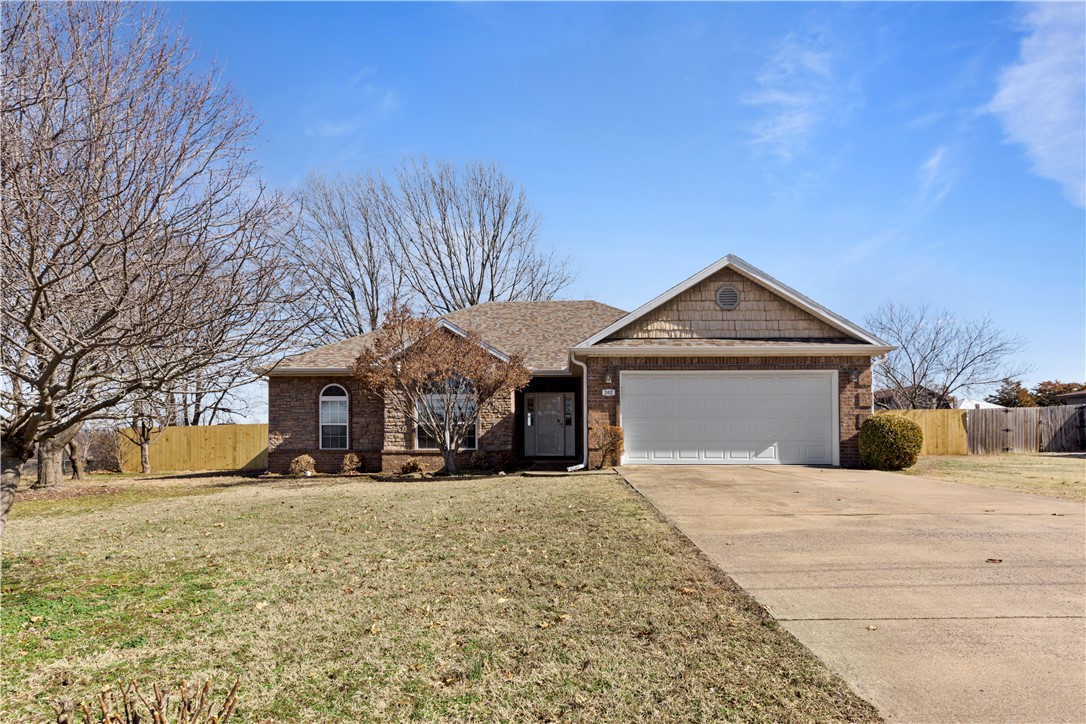 Perfect rental just minutes from everything Downtown Bentonville has to offer. Walk to Orchards Park, Crystal Bridges, the Amazeum, public swimming pool and Schools. Or hop on the trail for just short bike ride to 8th St Market and the Momentary. Backing up to WJHS practice fields to the Northeast and Orchards soccer fields to the North. Large living room with vaulted ceilings. Spacious kitchen with plenty of cabinet space. Covered patio and fenced yard on a dead end street right in the heart of everything. Utilites included with rent are gas, electric, water/sewer. Refrigerator and washer/dryer included.