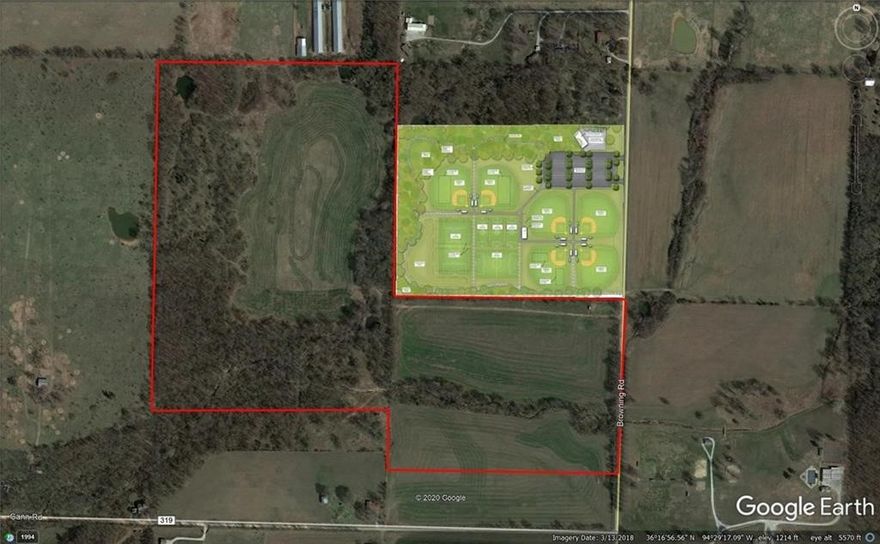 Right next to the soon to be constructed Gentry Sports Complex. This property has great development potential. Small stream runs through it.