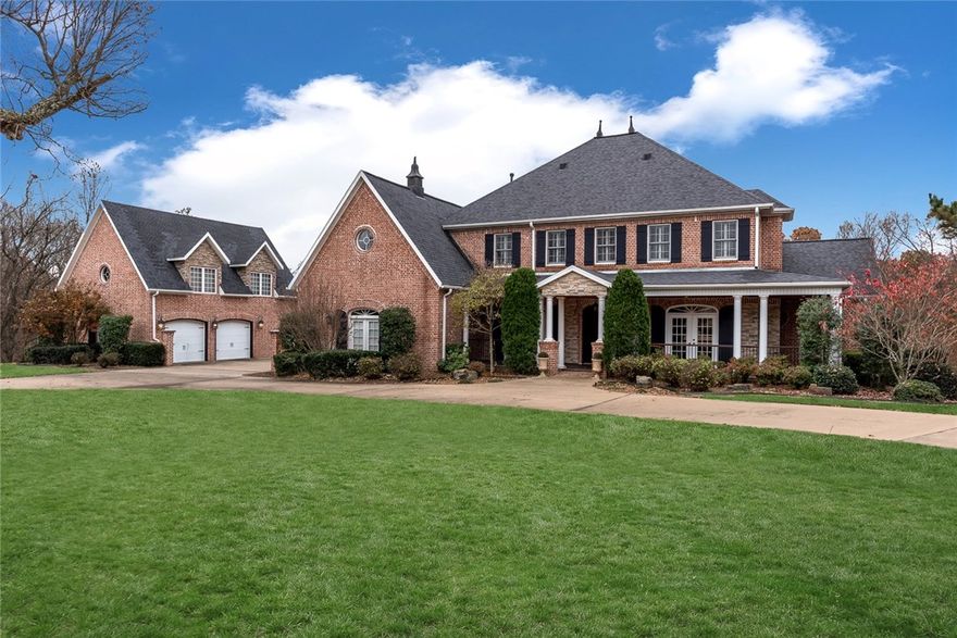 Southern Living Inspired Estate!   One of Talamore's most elegant homes complete with detached guest house, pool, multiple outdoor living areas, home theater and all sitting on 3 beautiful acres!    This home has absolutely everything!   Custom-designed throughout, beautiful iron balcony and catwalk railing overlooking two story living area, large eat-in kitchen, formal dining and sitting rooms.   Huge game room plus don't miss the additional home theater room on the third level!   Outdoor fireplace and covered verandas complete this spectacular outdoor living and entertaining area!   This home is truly one of a kind!