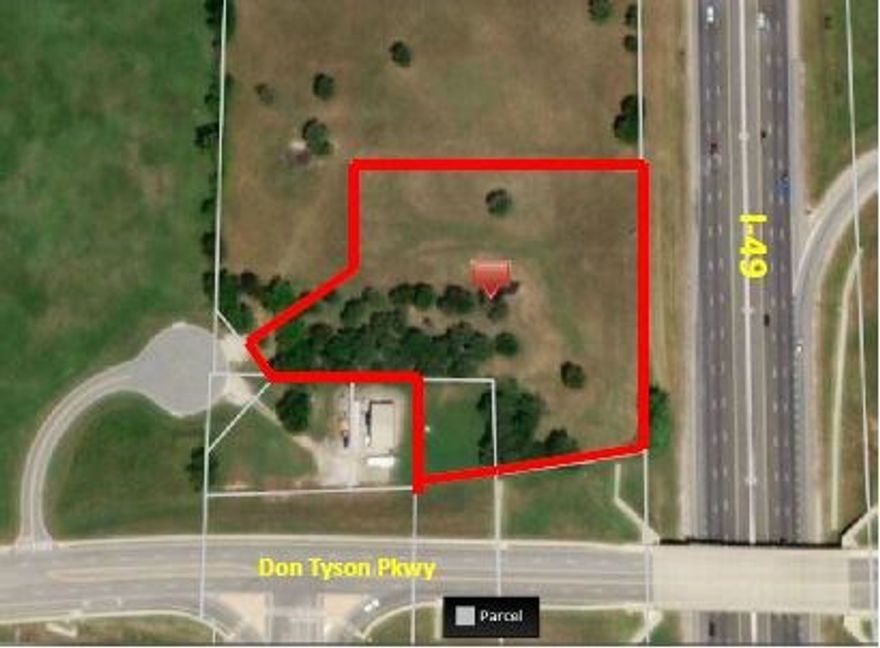 2.76(+/-) acres. High visibility commercial property located at the intersection of Don Tyson Pkwy & I-49. Many potential possibilities for a new business!