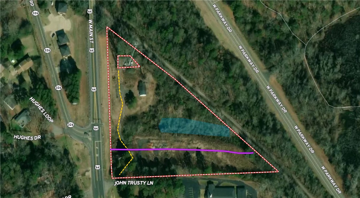 FSBO. Zoned C4 and R1, property consists of 3.98 acres with partial flood zone, cell tower property, and sewer and access easements across it.