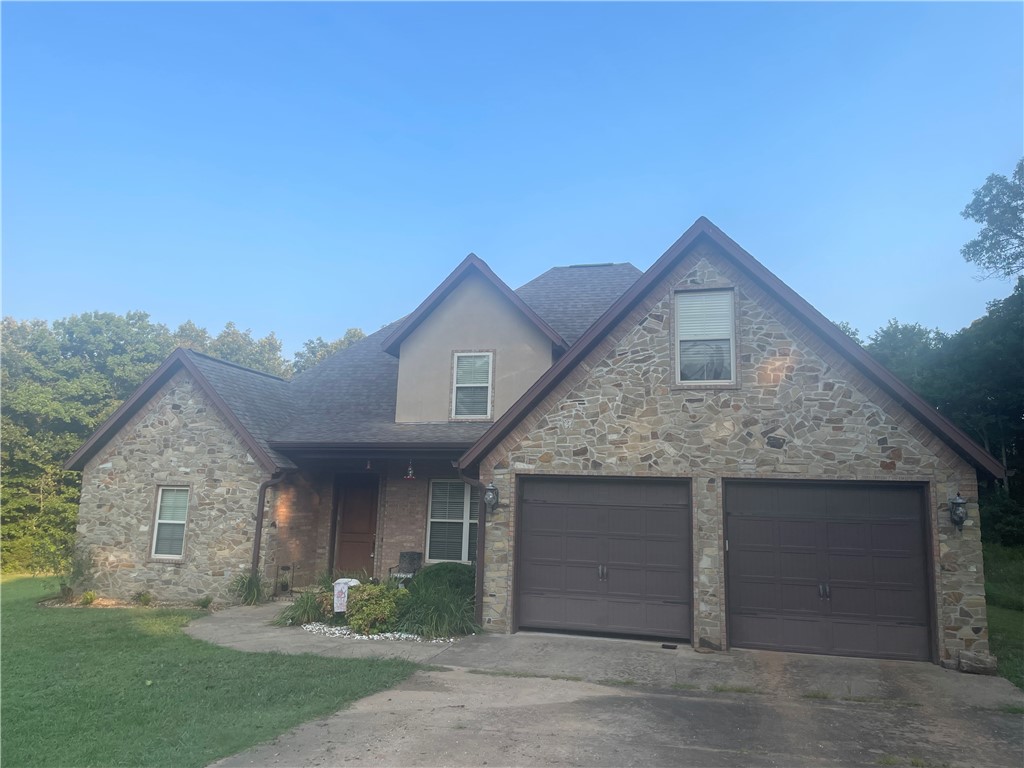 Escape the hustle & bustle to this beautiful home surrounded by trees. Listen to the birds chirp as you sip your morning coffee or unwind while watching the wildlife. Home is on 2 acres with a 30x40 shop for all your tools or storage needs. 2,349 SF home with 3+ beds (4th can be used as a flex- game room/etc) with an additional screened in room leading to backyard.