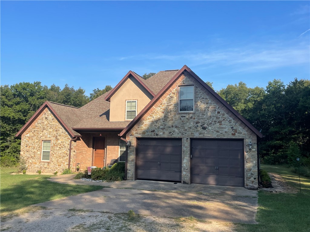 Escape the hustle & bustle to this beautiful home surrounded by trees. Listen to the birds chirp as you sip your morning coffee or unwind while watching the wildlife. Home is on 2 acres with a 30x40 shop for all your tools or storage needs. 2,349 SF home with 3+ beds (4th can be used as a flex- game room/etc) with an additional screened in room leading to backyard.