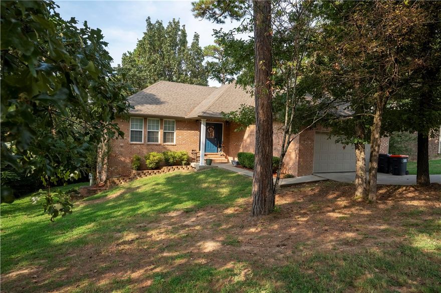 Pretty and pleasing perfectly describe this splendid 4-bedroom, 2.5-bath home tucked away in beautiful West Russellville! The charm begins at the curb with welcoming appeal, then continues inside where you'll find stylish laminate flooring, freshly painted cabinets, and a spacious master suite featuring a separate tub and shower plus generous walk-in closets. A cozy new fireplace anchors the living room, while not one but two freshly updated decks invite you to relax or entertain outdoors. With thoughtful updates throughout, wood burning fireplace, this home is ready for its next happy chapter!