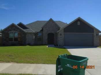 Built in 2021 this 3 bed 2 bath home is just minutes from Downtown Bentonville and the Walmart Home Office. This property includes a privacy fenced yard, luxury vinyl plank flooring, granite counter tops, 2" faux wood blinds, custom tile shower in master and much more!