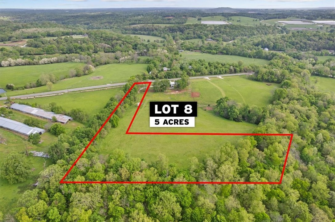 With gently rolling hills and a creek running along the edge, experience the peace and tranquility of your own private retreat on one of four beautiful building lots! Escape the bustle of town but enjoy the convenience of being just minutes from excellent Fayetteville schools and shopping. Ranging from 2-5+ acres, each lot has its own unique features allowing you to build the perfect home to suit your needs and taste. New well is included for each lot, utilities are at the road.