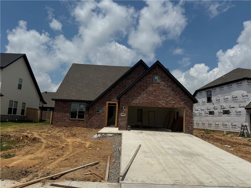 East facing new construction home in Woodlands Crossing!  2 bedrooms downstairs and 2 bedrooms upstairs.  Several of the features in this home include an upgraded 3 cm quartz counters throughout, upgraded tile backsplash, a designer brick fireplace, 4 disk lights in all of the bedrooms. Other amenities include custom cabinets with soft close hinges, stainless steel appliances with a designer gas range vented to the exterior, tall ceiling, low-e windows, designer lighting, luxury vinyl plank flooring, low-e windows, 2" faux wood blinds, full privacy fence with two walk gates, full gutters with downspouts, irrigation system in the front and back w/ an exterior control, lots of trees and more! Preferred lenders are paying up to $5,000 toward closing costs, prepaids, or discount points.  Buyer cannot pick from remaining selections and no changes can be made to the property.