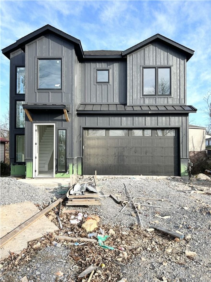 New construction home near downtown Bentonville! Located near bike trails, schools, the Neighborhood Market, Airship Coffee, and provides easy access to I-49! This modern home features 5 bedrooms and 4.5 baths! The primary suite boasts a huge walk-in closet, custom tile shower, and soaking tub. Enjoy a gorgeous entry staircase and the abundance of natural light throughout! Wood floors! (no carpet) Entertain in the kitchen, complete with floor-to-ceiling custom cabinets, a large island, 3 cm quartzite countertops, gas range, and pantry. 2 car garage. Custom finishes throughout. As an added bonus, receive $3,500 towards buyer's closing costs when working with the builder’s preferred local lender! Schedule your showing today!