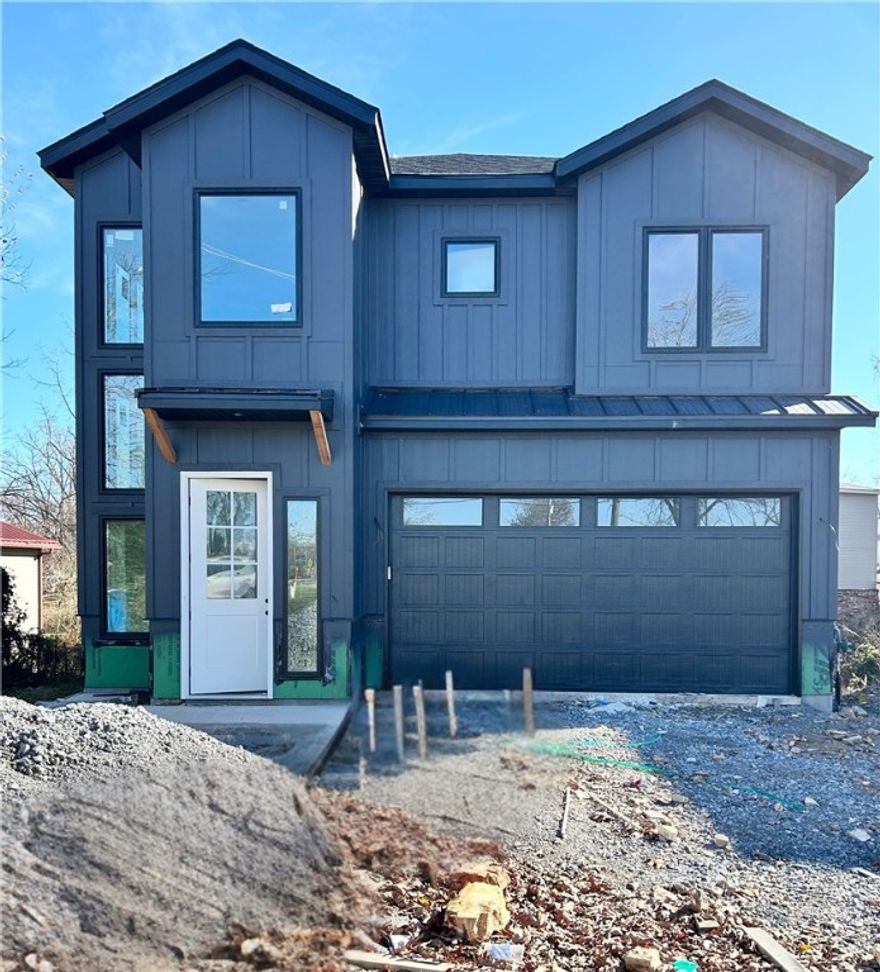 New construction home near downtown Bentonville! Located near bike trails, schools, the Neighborhood Market, Airship Coffee, and provides easy access to I-49! This modern home features 5 bedrooms and 4.5 baths! The primary suite boasts a huge walk-in closet, custom tile shower, and soaking tub. Enjoy a gorgeous entry staircase and the abundance of natural light throughout! Wood floors! (no carpet) Entertain in the kitchen, complete with floor-to-ceiling custom cabinets, a large island, 3 cm quartzite countertops, gas range, and pantry. 2 car garage. Custom finishes throughout. As an added bonus, receive $3,500 towards buyer's closing costs when working with the builder’s preferred local lender! Schedule your showing today!