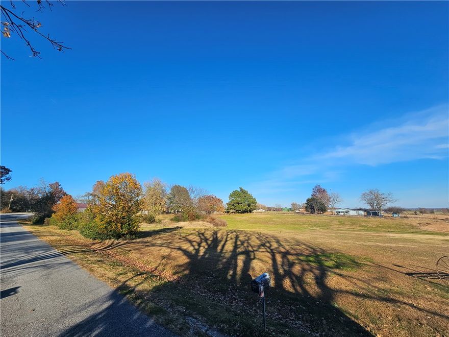 This versatile 3.25-acre property in Northwest Arkansas offers an outstanding opportunity for either commercial or residential development. Ideally situated just 4 miles from XNA Airport and centrally located near Bentonville, Cave Springs, Centerton, and Gentry, the site provides convenient access to major growth corridors while maintaining a peaceful setting. With flexible potential and a prime location, this acreage is the perfect place to bring your next project or vision to life.