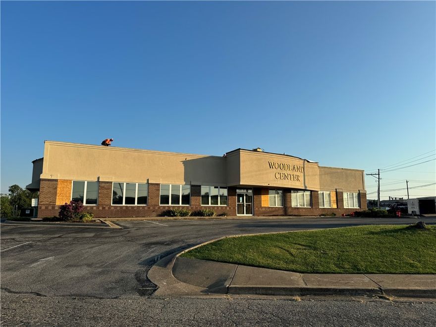 Sold before print. Professional office building for sale. Located on 13th street in Rogers, this 7,668 sqft is ready to finish out for new tenants. Great location with plenty of parking, visibility and adjacent to bike trail. Can be single tenant or multi-tenant. The owner is currently completing repairs from storm damage. Property is located in the Opportunity Zone. Property being sold AS-IS.