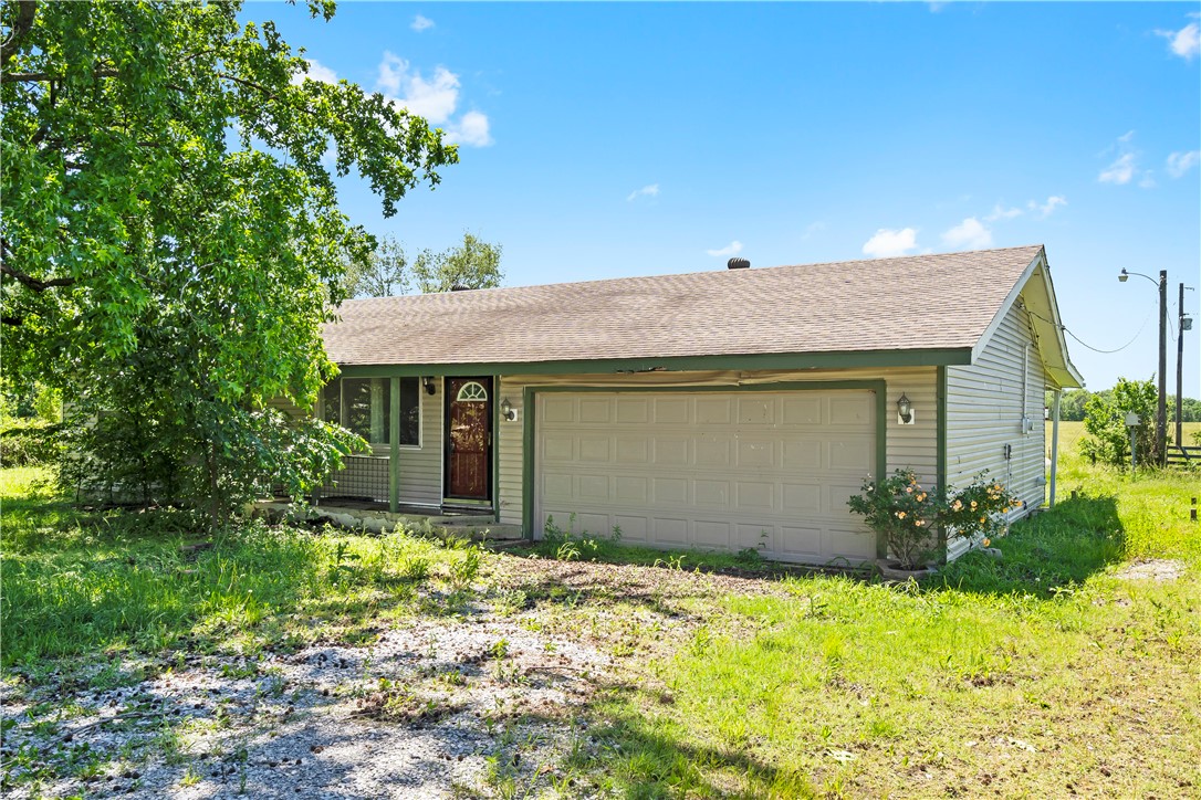 Discover this incredible investment opportunity in Gentry! This property boasts 2.70 acres of land along with a 3-bedroom, 2-bath home that features not one, but two living areas, providing ample space for relaxation and entertaining.
This fixer-upper is perfect for those looking to put their personal touch on a property or for investors seeking a promising project. With the space for potential expansion or new construction, the possibilities are endless. This property has a few unfinished projects/ needs and is being sold as-is with no repairs.
Enjoy the peaceful surroundings of country living and come see this one today.