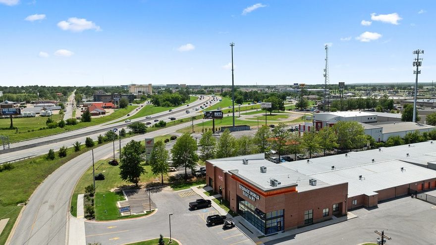 4,925 SF Warehouse/Flex Space at 742 S 48th St, Springdale. Prime location with excellent visibility and quick access to I-49 & Hwy 412. Clear-span layout, 18–20 ft ceilings, polished concrete floors, bright LED lighting, insulated ceiling with HVAC in select areas. Two drive-in overhead doors, two ADA restrooms, utility sink, and office/flex area. Ample on-site parking including ADA spaces. Zoned for light industrial/commercial uses, ideal for distribution, automotive, light manufacturing, or service businesses. Immediate availability; negotiable lease terms. Additional space available if interested in combining Suites.