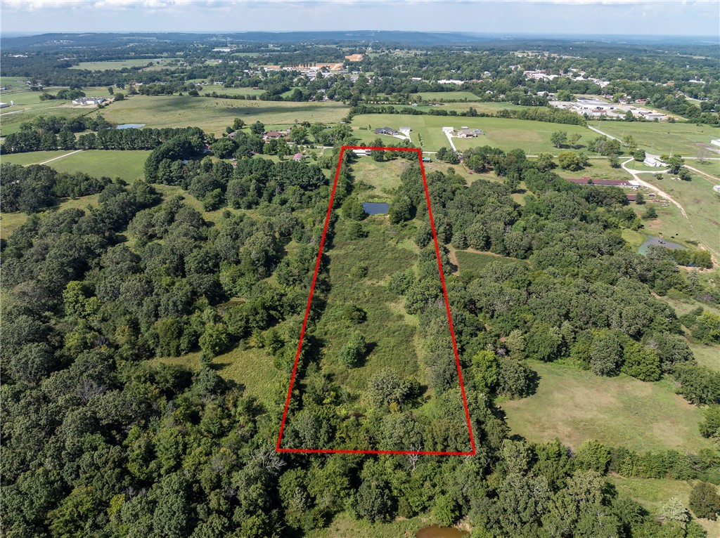 Whether you are looking for a renovation opportunity or a beautiful piece of land to build your dream home on, this is the spot! With 7.5 gorgeous acres just moments from DT Lincoln, this location is the perfect blend of privacy and convenience. With a spring fed pond, plentiful pasture space and sweeping views, this is a place you can build memories for years to come. The house is in disrepair and needs significant repairs but if you want to build sweat equity or just build a new home, here is your opportunity!