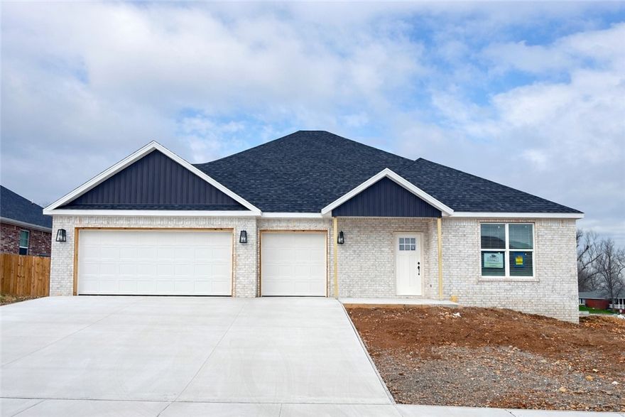 Welcome to Spring Creek Farms, located in the heart of Northwest Arkansas (Cave Springs/Elm Springs). There is something for everyone! A pool, playground & walking trails will be coming in phase 3. Shaw Elementary is just steps away. Enjoy pickleball, tennis, walking trails & more at nearby Shaw Park. This neighborhood has spacious lots with many backing up to green space. Call for more details & options available. The Baxter II Plan is a one-level, 4-bed, 3-bath layout designed with modern living in mind. Features include: 3 car garage, open floor plan, vaulted ceiling with beams, gas log fireplace, soft close custom cabinets to the ceiling, gas range with fully vented hood, built-in microwave and a spacious walk-in pantry in the kitchen. The primary suite features a large walk-in shower for the ultimate spa-like experience. A large back covered patio is complete with internet and gas hookups, ready to entertain. All of this on a great corner lot! A preferred lender credit is available.