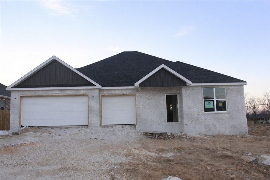 Welcome to Spring Creek Farms, located in the heart of Northwest Arkansas (Cave Springs/Elm Springs). There is something for everyone! A pool, playground & walking trails will be coming in phase 3. Shaw Elementary is just steps away. Enjoy pickleball, tennis, walking trails & more at nearby Shaw Park. This neighborhood has spacious lots with many backing up to green space. Call for more details & options available. The Baxter II Plan is a one-level, 4-bed, 3-bath layout designed with modern living in mind. Features include: 3 car garage, open floor plan, vaulted ceiling with beams, gas log fireplace, soft close custom cabinets to the ceiling, gas range with fully vented hood, built-in microwave and a spacious walk-in pantry in the kitchen. The primary suite features a large walk-in shower for the ultimate spa-like experience. A large back covered patio is complete with internet and gas hookups, ready to entertain. All of this on a great corner lot! A preferred lender credit is available.