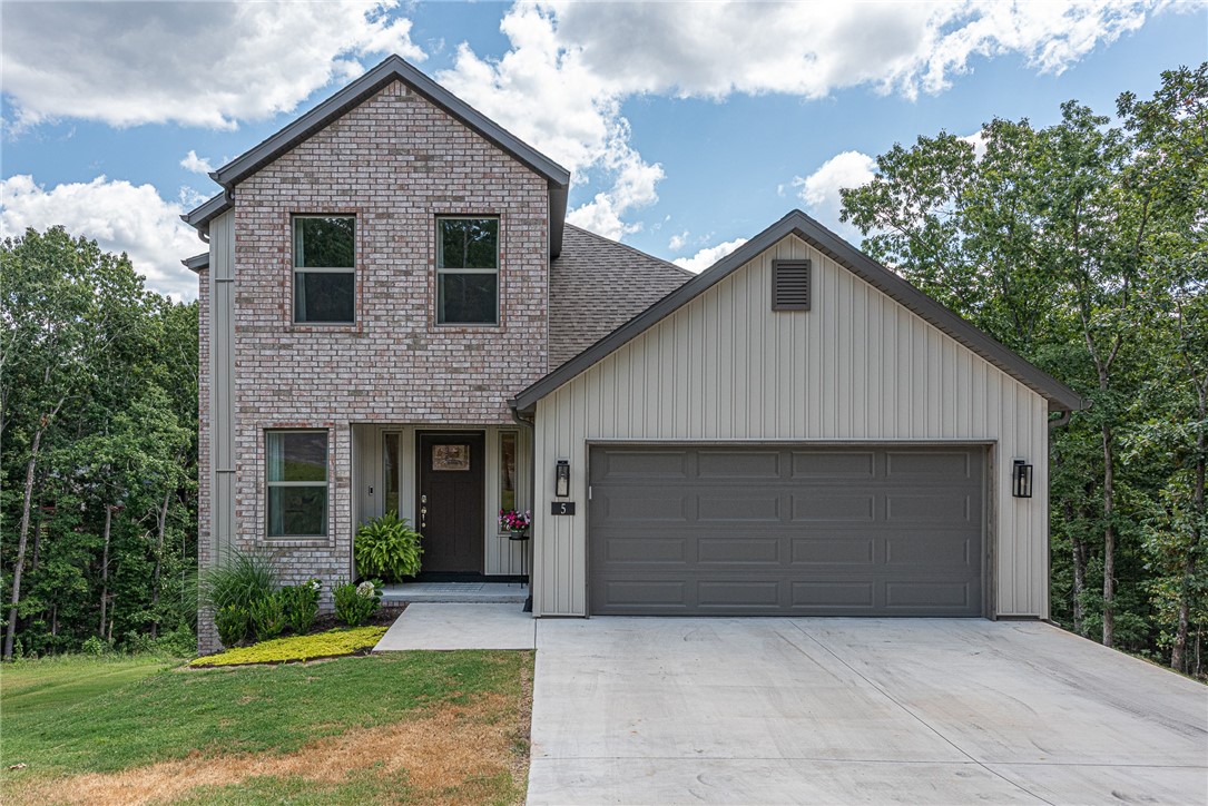Home sweet home! This LIKE NEW 3 bedrm 2.5 bathrm home built in 2024 is located min away from Scotsdale Golf Course, Loch Lomond Lake, & Bella Vista Mountain biking trail - Tunnel Vision! From the covered front entry head inside to an open concept main living space with LVP wood flooring throughout the main area. Kitchen features white cabinetry, 3cm quartz countertops, tiled backsplash, large center island with room for seating, & walk-in pantry! Formal dining space has tons of natural light overlooking the surrounding mature trees great for nature enthusiasts! Large living room with vaulted ceiling! Main floor primary with private ensuite with granite counters, dual sink vanity & shower! Main floor half bath for guests! 2 more bedrooms & a full bathroom upstairs! Head out back to the covered deck perfect for the summer and upcoming fall overlooking your spacious backyard! Bella Vista POA incl: private community amenities such as golf courses, lakes, hiking/biking trails, swimming pools, and more!