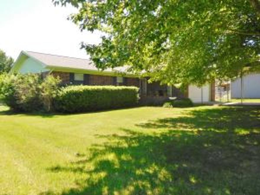 Immaculate all brick 3BR, 2BA home in quiet neighborhood offers spacious living area, updated kitchen w/granite countertops and stainless steel appliances, freshly painted throughout, ceramic tile & bamboo flooring, and near new screened porch. Other features include large 2 car garage, double carport, fenced yard, nice shed, pergola, and nice landscaping. A MUST SEE!