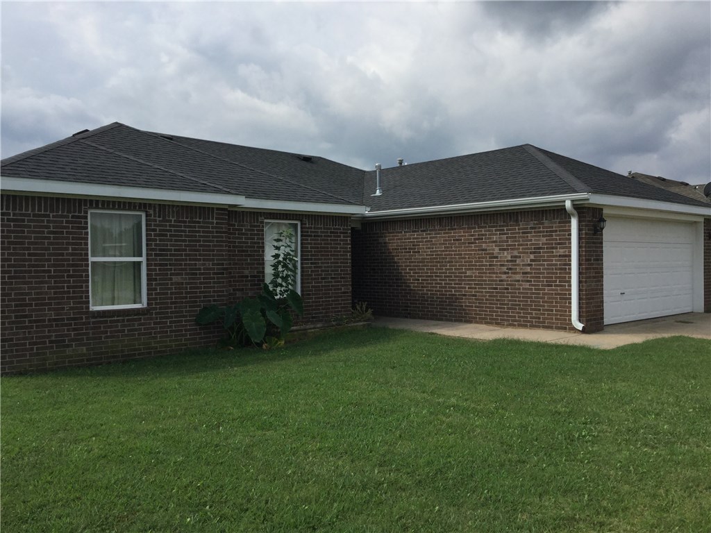 Nice 3 bedroom, 2 bath, 2 car garage, on large lot close to baseball park in Gravette.