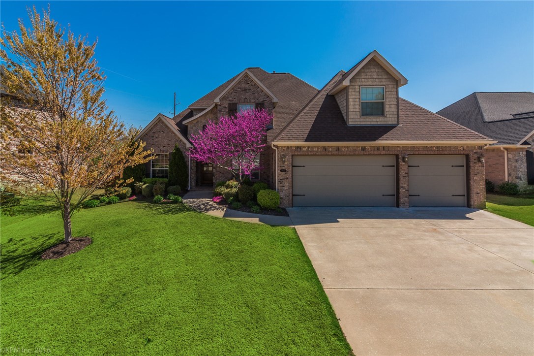 Luxurious living in Lochmoor Club! This 2 level home hosts all the "I-wants" & more! Real hardwood floors thru-out main floor. NEW carpet. Office plus formal dining room, chef's kitchen with SS appliances, double ovens, & gas range. Large living area w/beams in vaulted ceiling & gas log fireplace. Master Suite w/surround sound, double vanity, walk-in shower, jacuzzi tub,& walk-in closet. Upstairs has 3 bedrooms+THEATRE ROOM featuring a wet bar. Flat interior lot, covered patio, built-in grill off of oversized patio. Neighborhood amenities include pool, sporting courts, and playground!