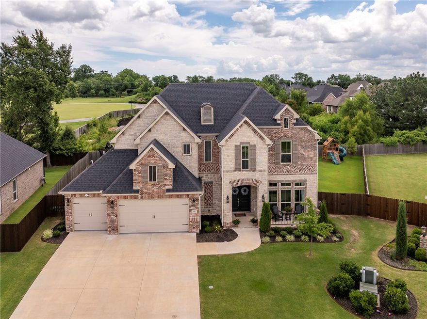 This stunning 2022-built luxury home is thoughtfully designed with high-end finishes & everyday functionality. Nestled in a quiet, low-traffic part of the subdivision, while being minutes from Mt Hebron Park, Greenway Trail System, Uptown Rogers, Walmart Amp & I-49. Exceptional curb appeal with professional landscaping & a meticulously maintained yard featuring Zoysia Palisades, a premium, golf-course-quality grass known for its carpet-like feel underfoot! The quaint front porch welcome you into a fresh open-concept layout filled with loads of natural light, & premium finishes. Kitchen features granite countertops, floor to ceiling custom cabinetry, SS appliances & a large pantry. The expansive primary suite includes a spa-like bathroom & generous walk-in closest. Amazing bonus room offers endless possibilities, playroom, fitness area - this space easily adapts to your lifestyle. Covered patio with cozy fireplace for year-round comfort. Spacious, private backyard with no home behind. Truly Luxury meets Location!