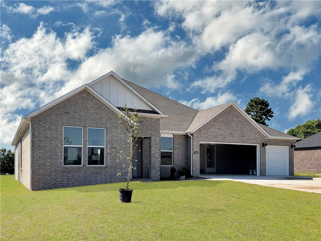 Fabulous Frisco plan with a 3-car garage in Monitor Meadows, where you'll experience modern luxury in Springdale, Arkansas. Our meticulously crafted floor plans provide ample space for you to grow and thrive. Beautiful Quartz countertops in the kitchen with tile backsplash and 42-inch upper cabinets. Oversized island per plan. Black plumbing fixtures throughout! LED lighting throughout! Ceiling fan in the living room and bedrooms! Living room will have and a modern electric fireplace with a poplar mantle. Bedroom one has a fabulous en suite with an oversized walk-in shower with tiled walls, elongated commode and quartz countertops with dual sinks. Back door is a full lite glass with mini blinds. Approximately 1 acre lots!!