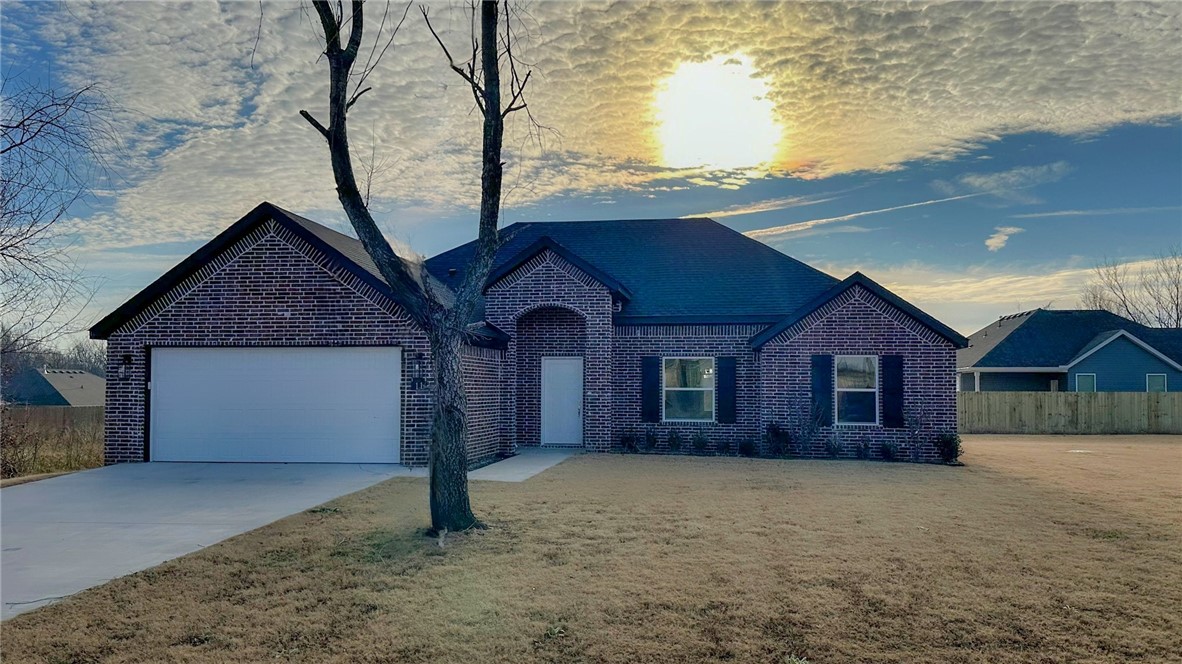 Convenience abounds with this stunning 3 bedroom 2 bath brick home on level lot that is very close to the Highlands Exit from Interstate 49. Custom Cabinets, quartz countertops, stainless, appliances, luxury viny plank with a spacious open living area are just a few of the many reasons this house should be on your must see list.